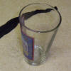 Glass used to hold open panty hose.